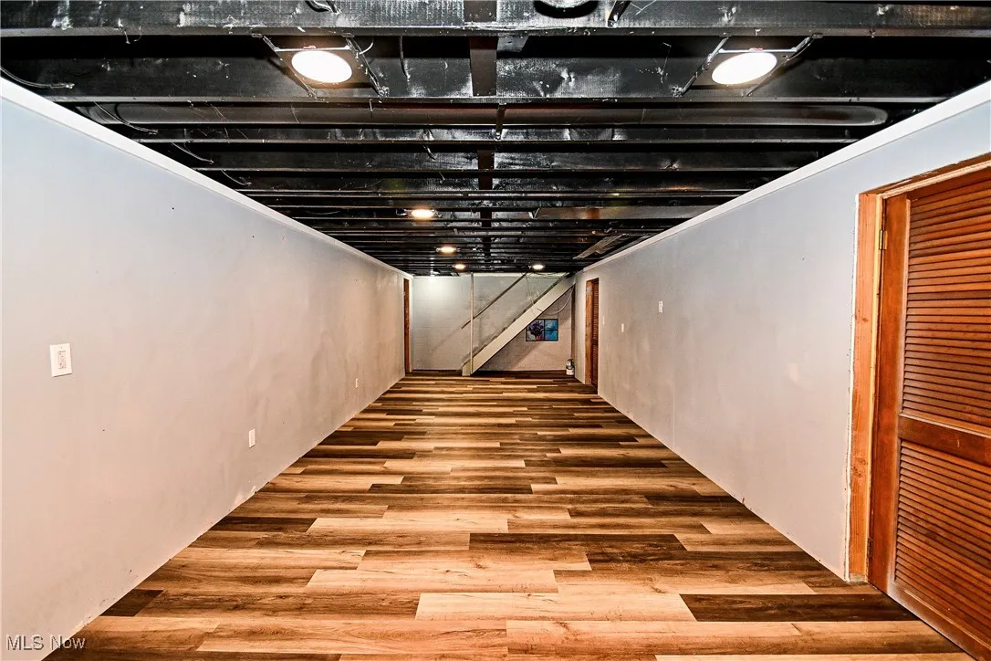 Finished below grade area with wood finished floors