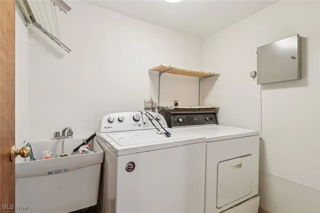 Laundry room with separate washer and dryer