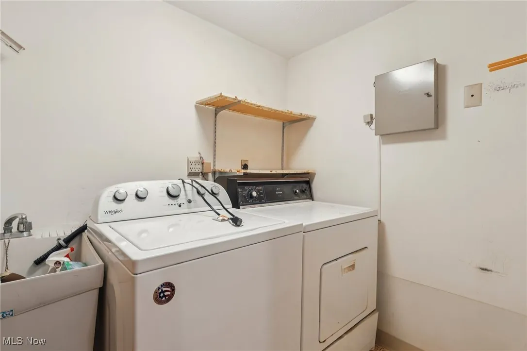 Laundry area featuring independent washer and dryer