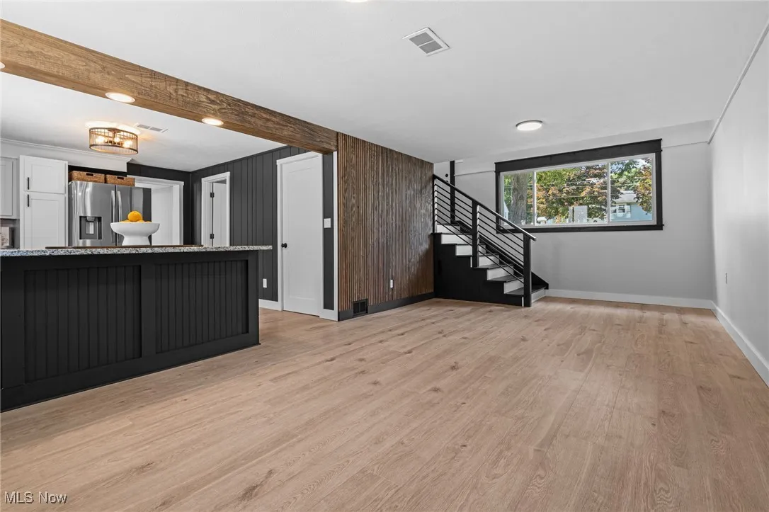 Flex space would make an ideal dining room/family room, opens to kitchen