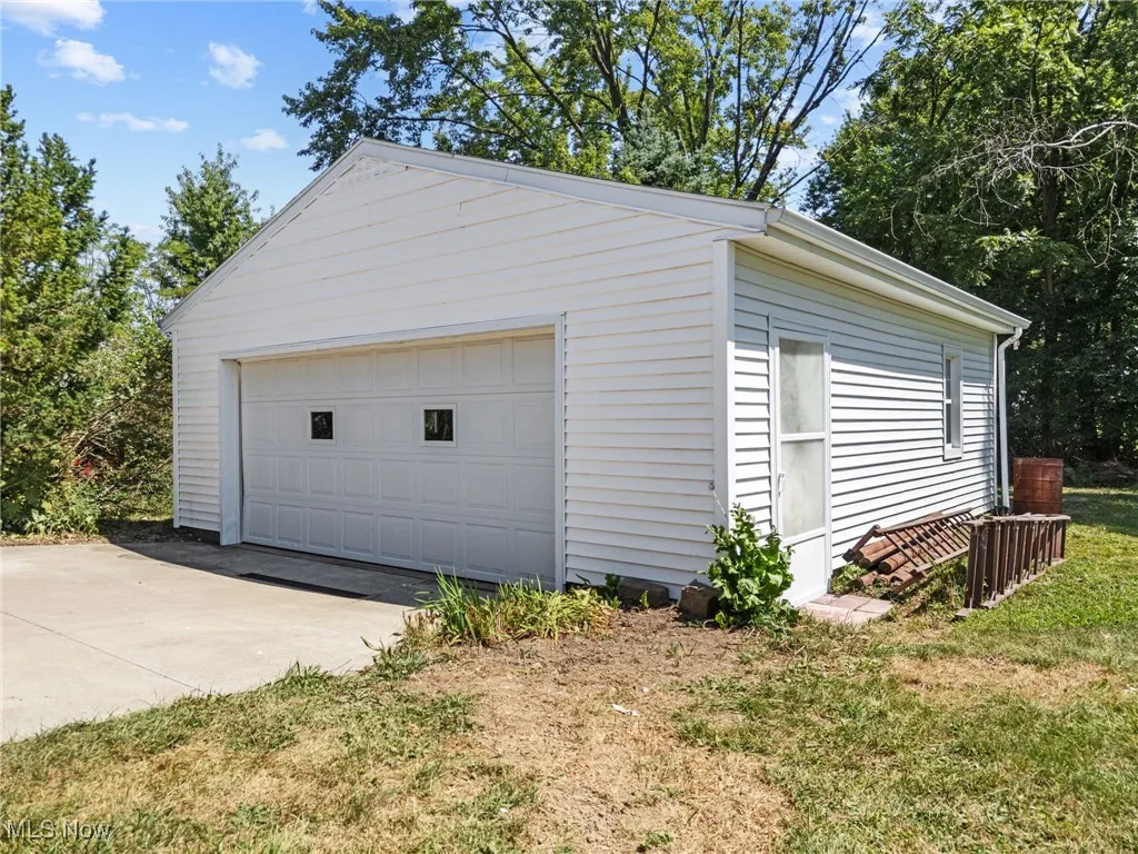 View of 2 car oversized detached garage w 200 service