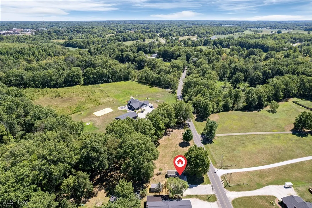 Drone / aerial view of a heavily wooded area
