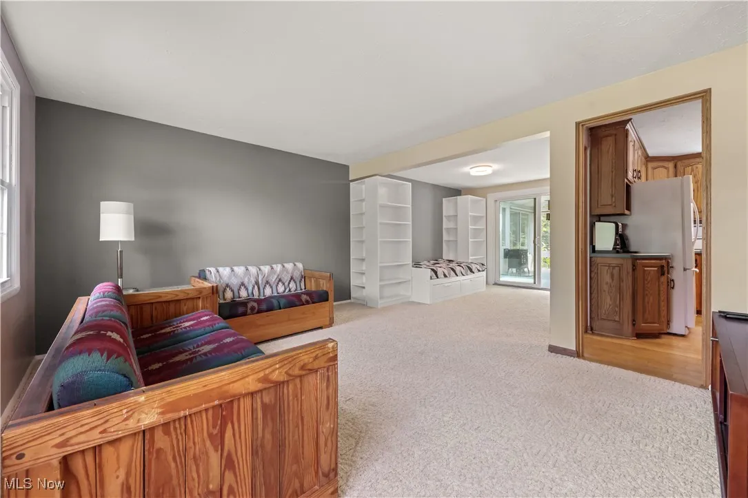 Living area with light colored carpet