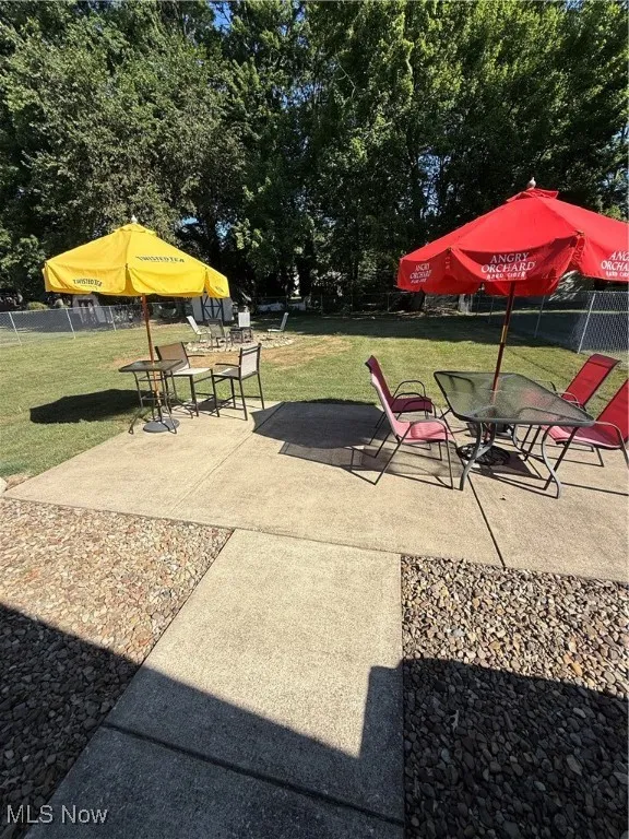View of patio with outdoor dining space