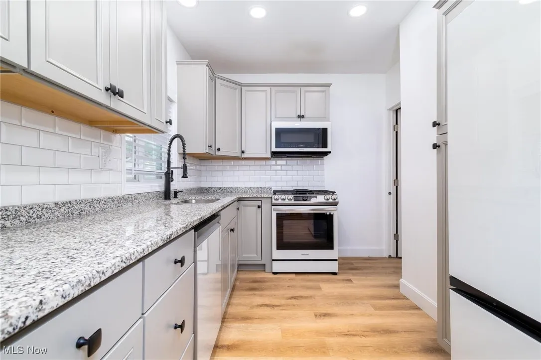 Kitchen with stainless steel appliances