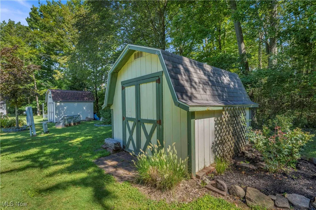 View of shed with view of scattered trees