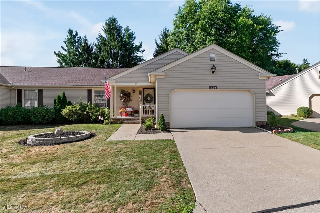 Front view of home with 2 car garage