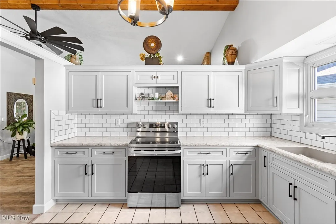 View of kitchen area with appliances