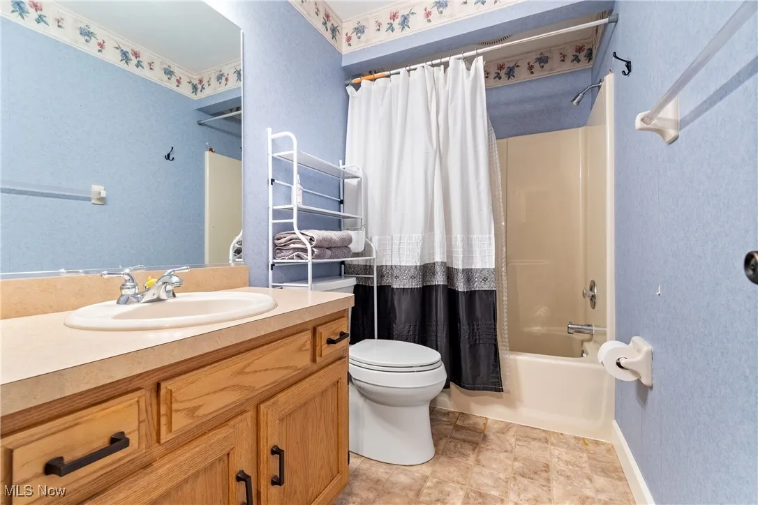 View of additional full bath area on main floor