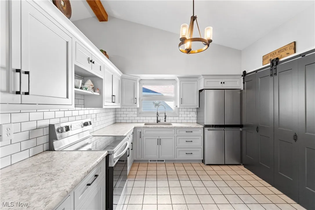 View of kitchen area/ laundry room