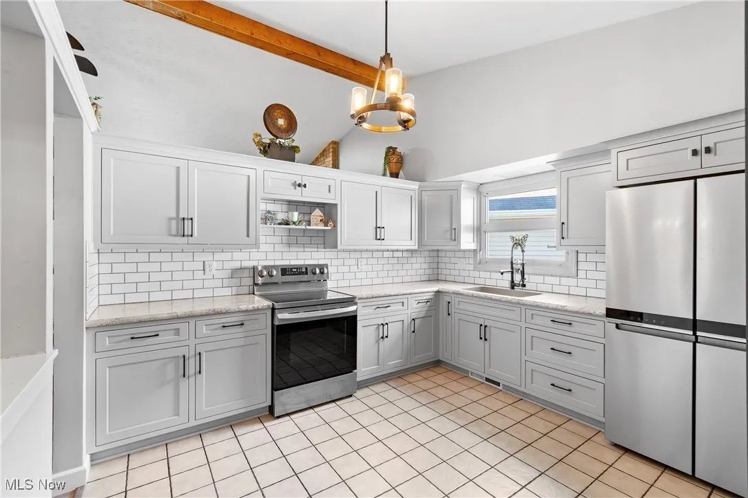View of kitchen area with appliances