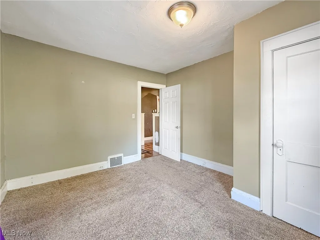 Bedroom with baseboards