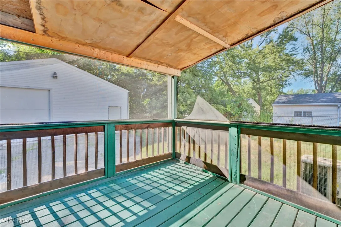 Deck featuring an outdoor structure