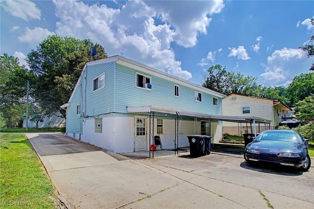Traditional home with concrete driveway