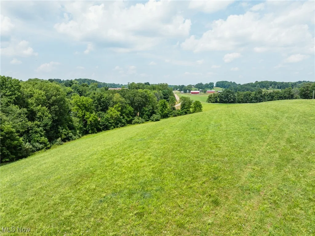 View of green lawn with a view of rural / pastoral area