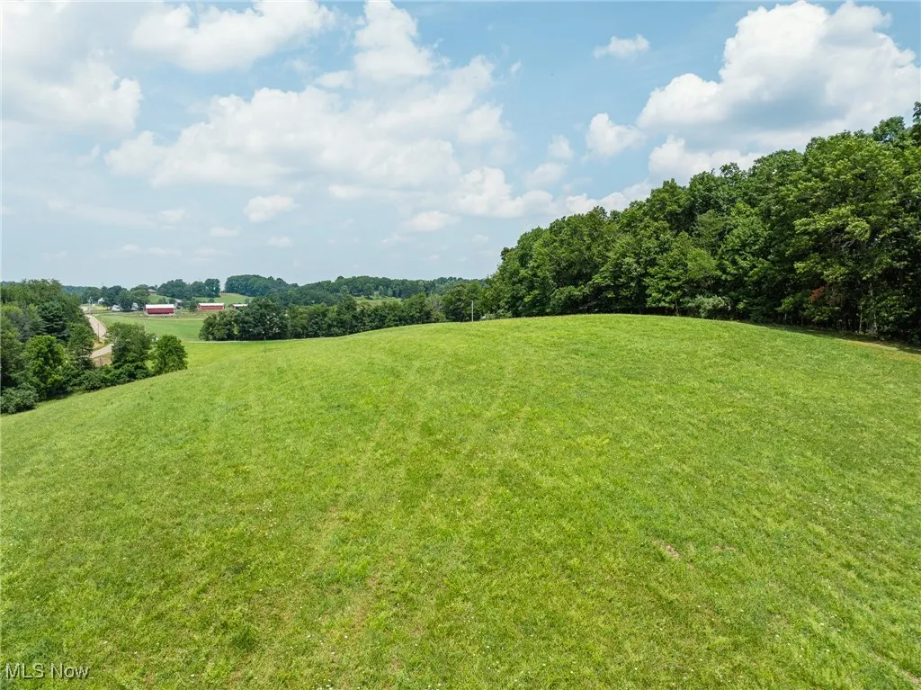View of grassy yard with a view of countryside