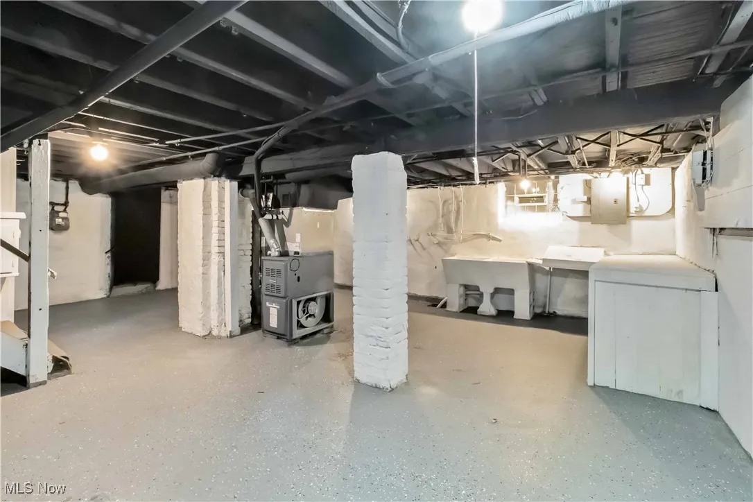 Unfinished basement with heating unit