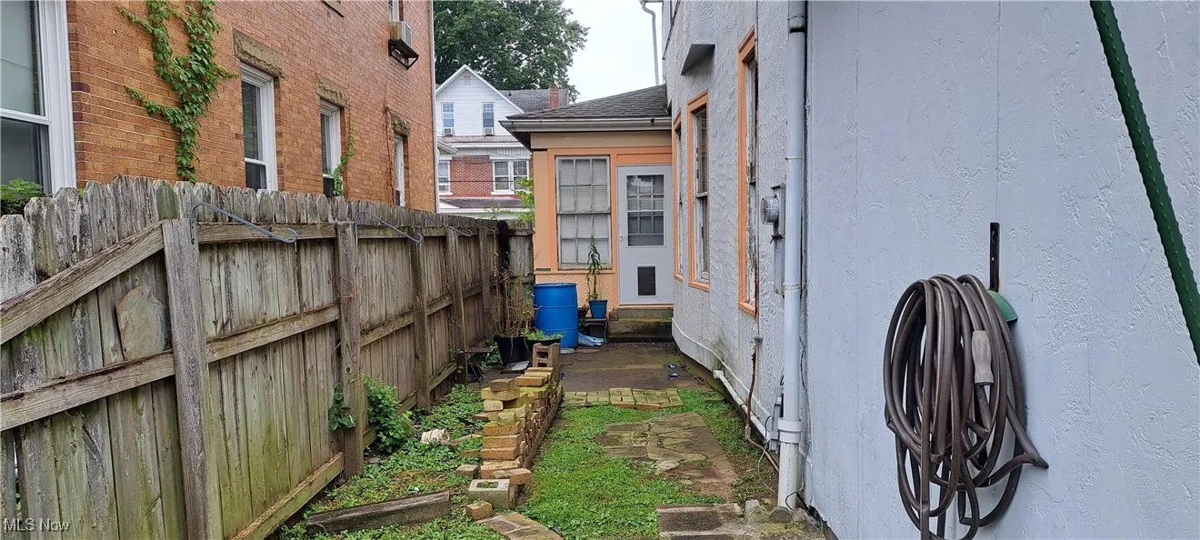 View of property exterior with stucco siding