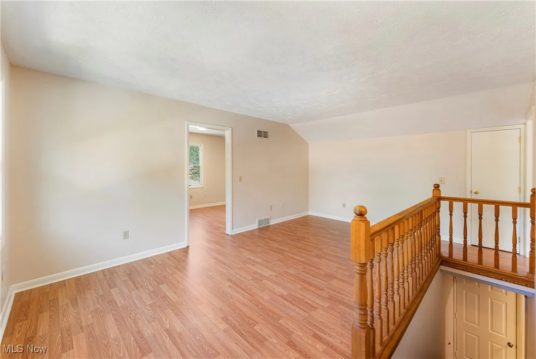 Spare room with light laminate floors