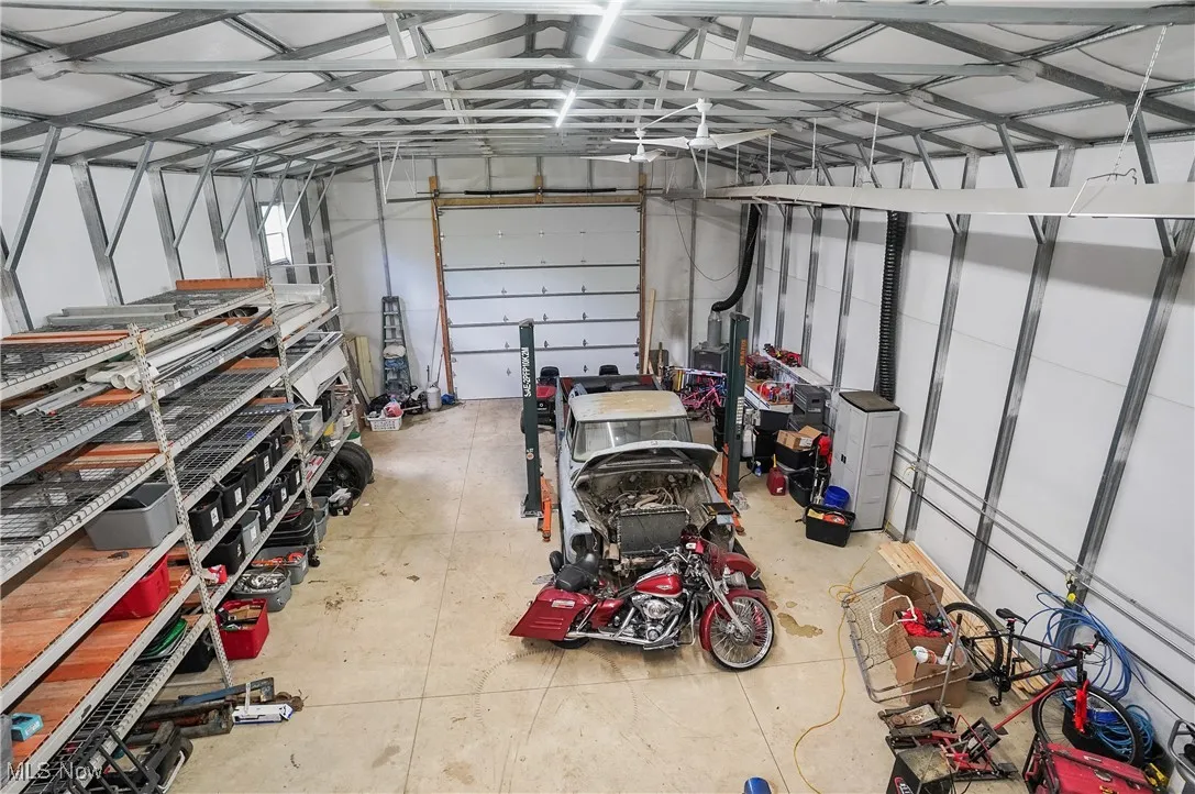 Garage featuring a workshop area