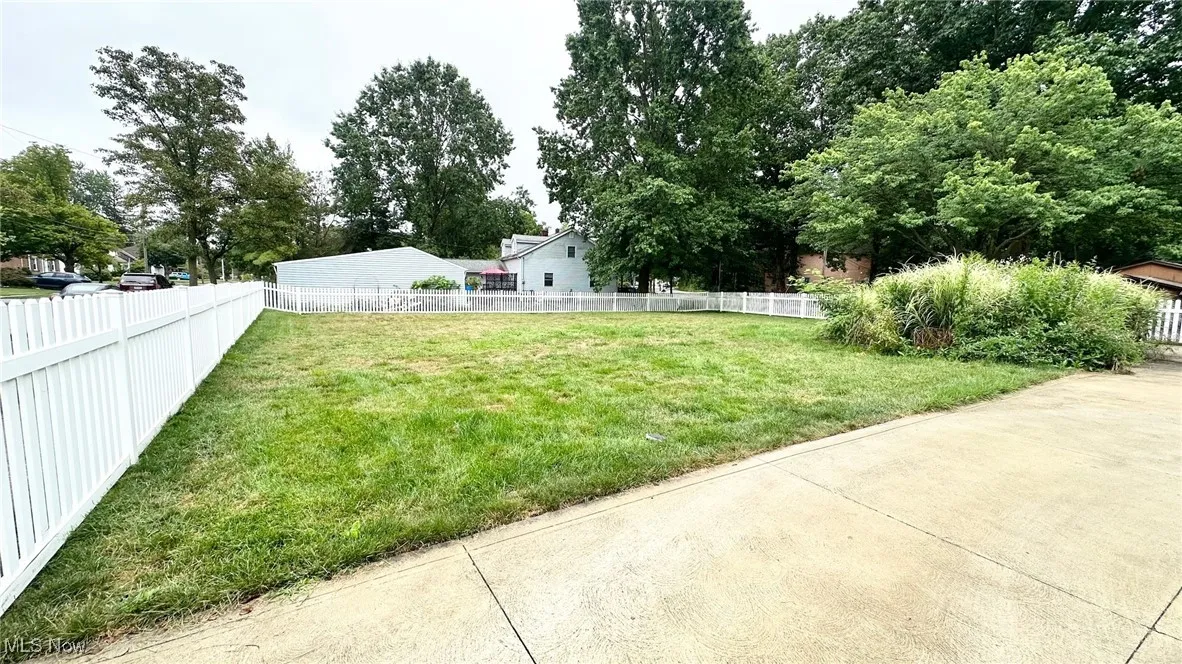 View of fenced backyard