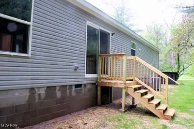Deck featuring stairs