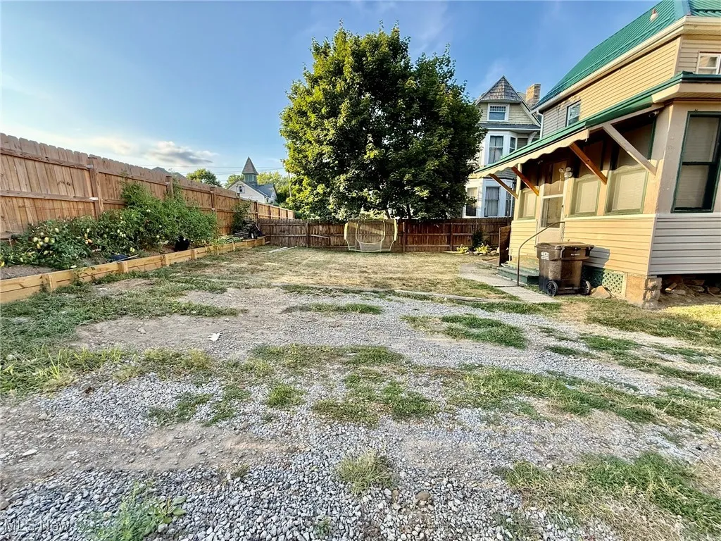 View of fenced backyard