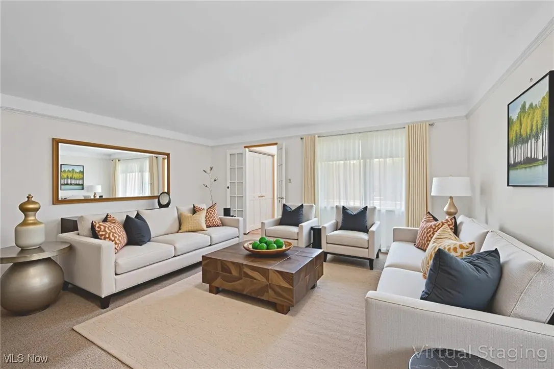 Living area featuring carpet