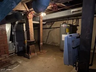 Unfinished below grade area with electric water heater