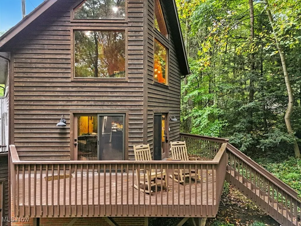 Back of property featuring a deck
