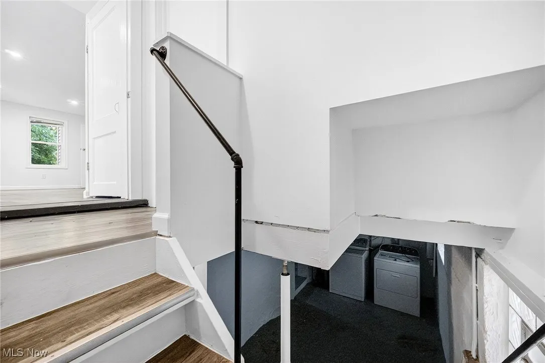Staircase with wood finished floors