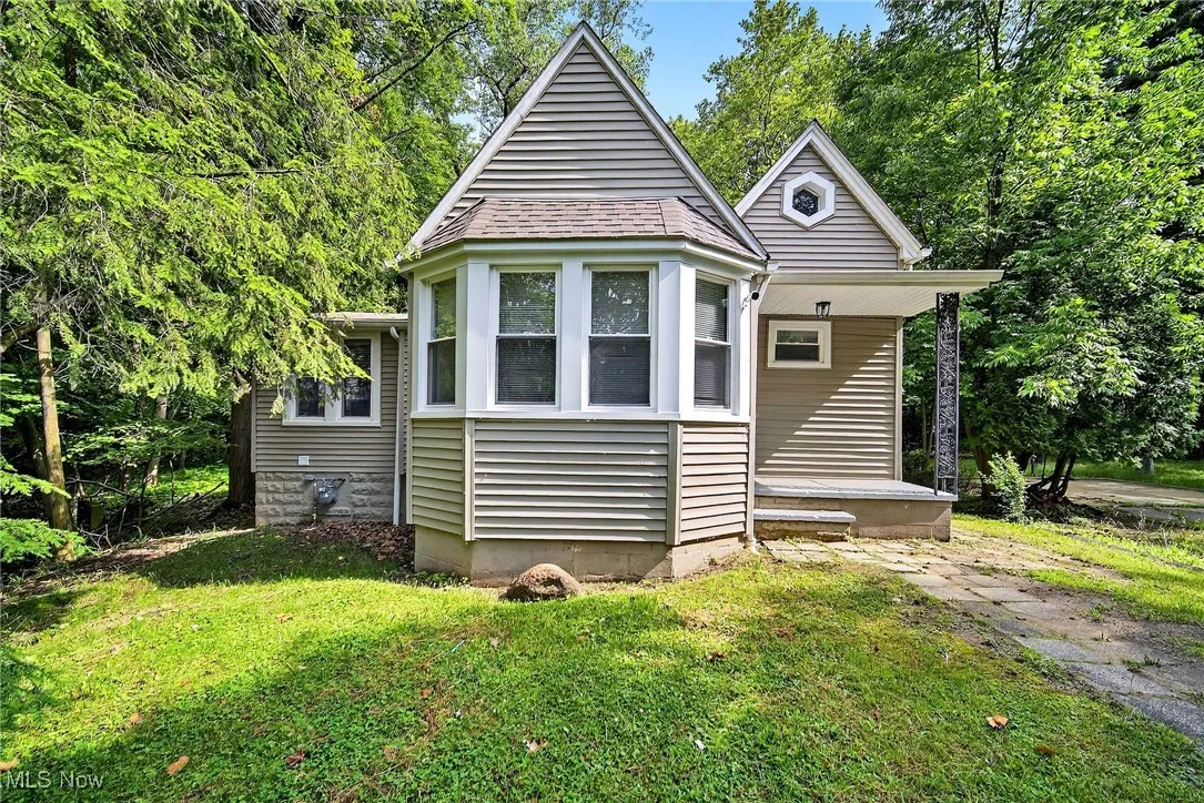 View of front of house with a front lawn
