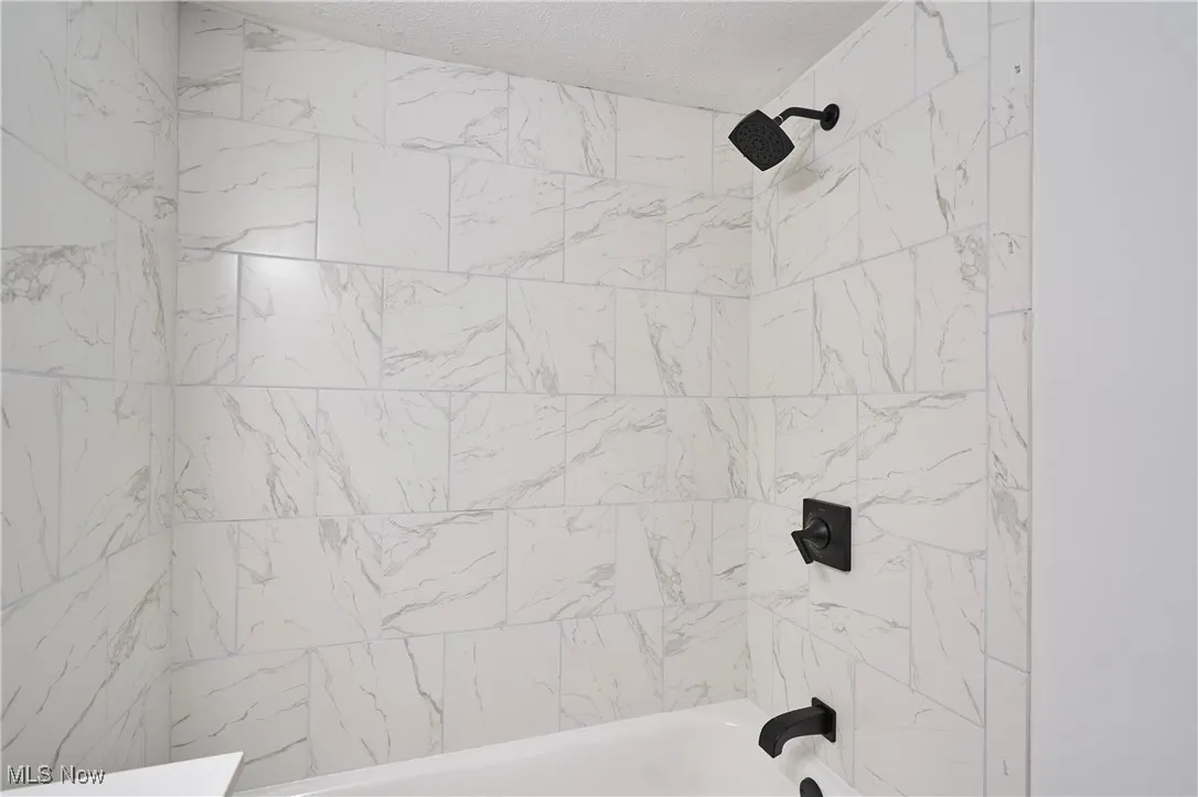 Bathroom featuring  gorgeous shower combination