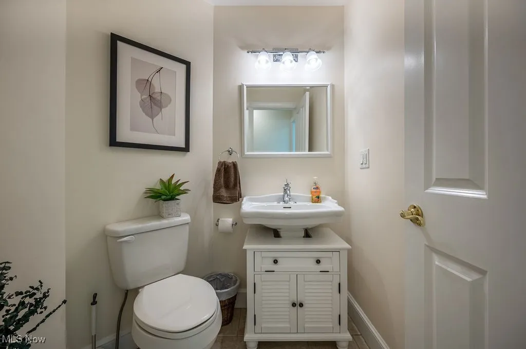 Bathroom with vanity and tile patterned floors