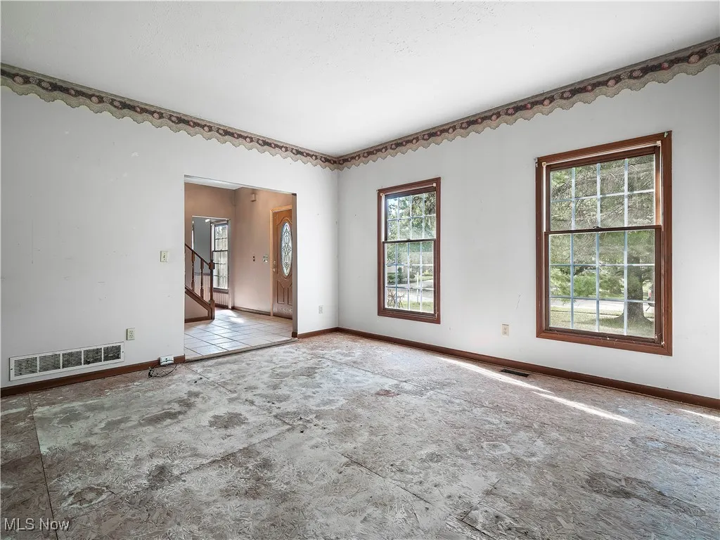 Empty room with healthy amount of natural light