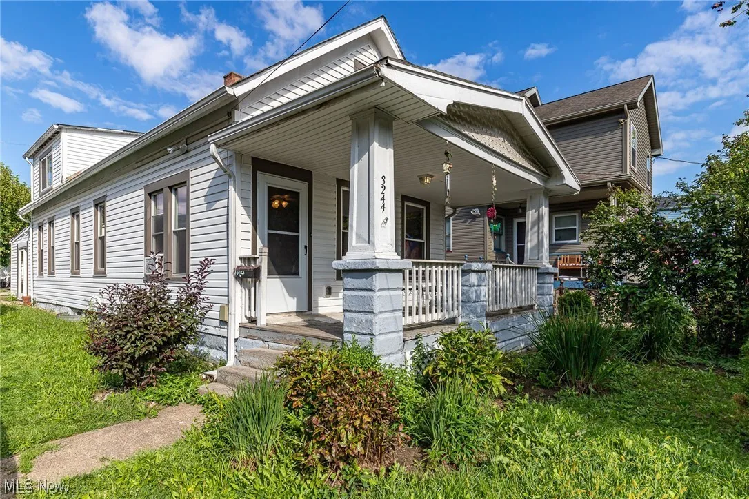 View of front of house featuring covered porch