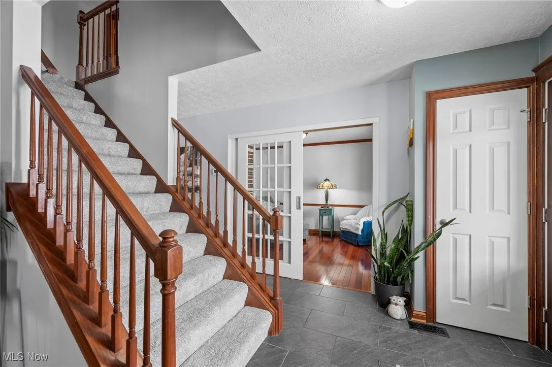 Foyer/entrance with a coat closet