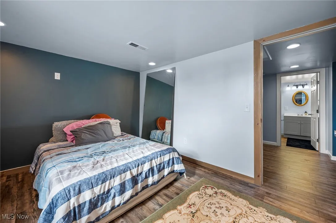Bedroom 4 in the basement with an egress window