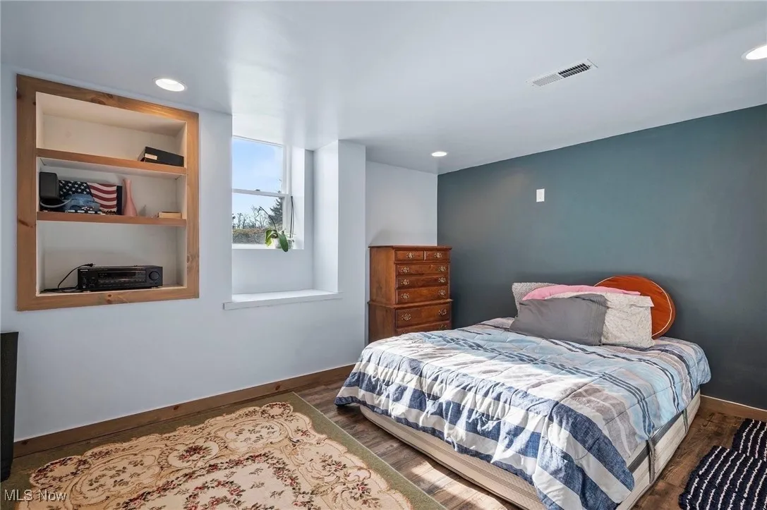 Bedroom 4 in the basement with an egress window