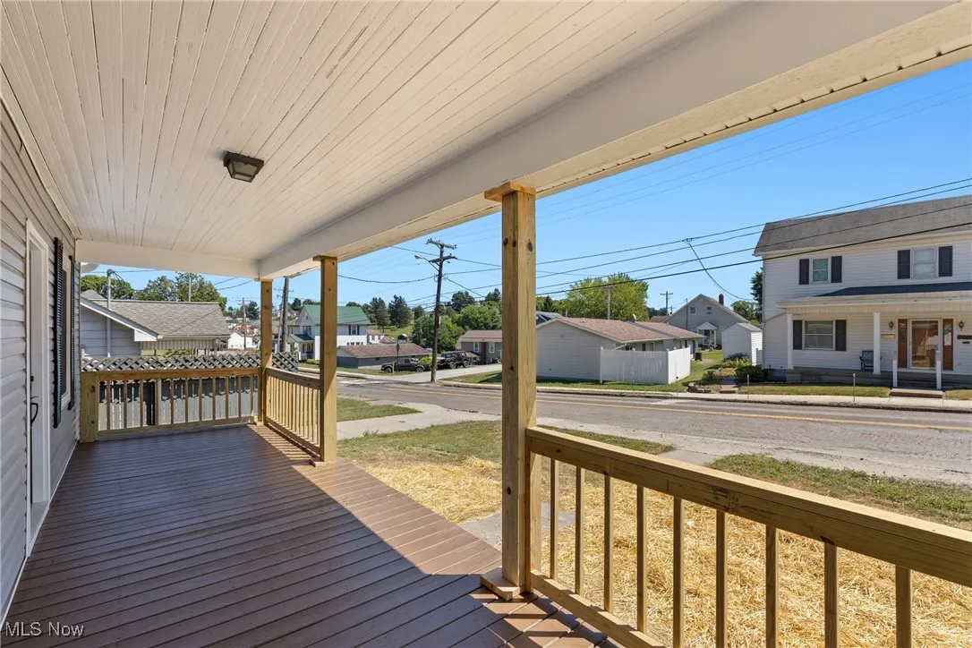 Porch featuring a residential view