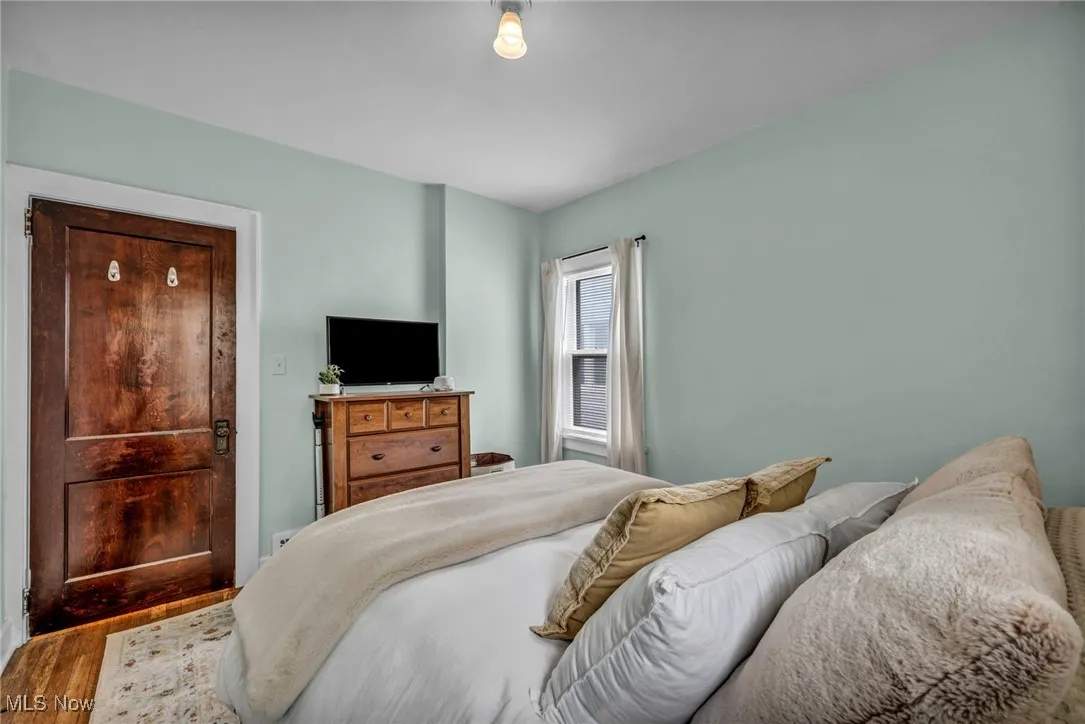 Bedroom featuring wood finished floors