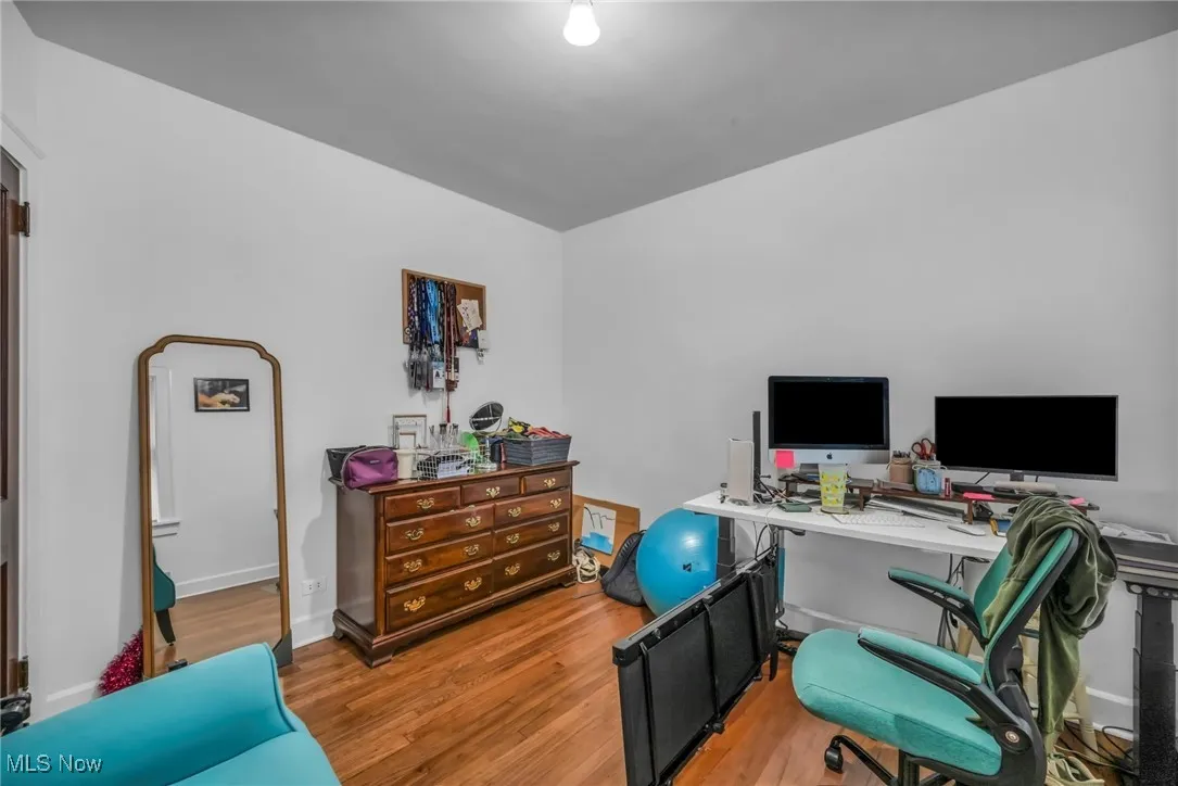 Office area with wood finished floors