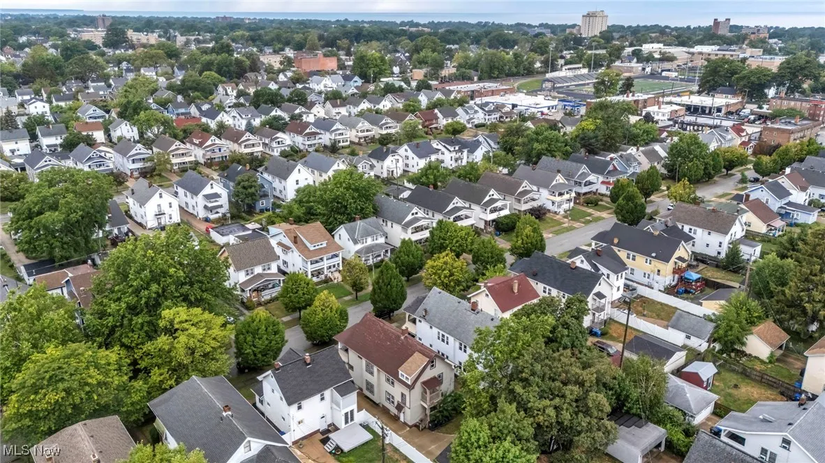 Aerial overview of property's location with nearby suburban area