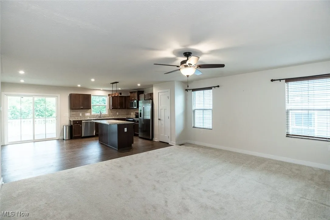 Plenty of natural light and custom blinds.