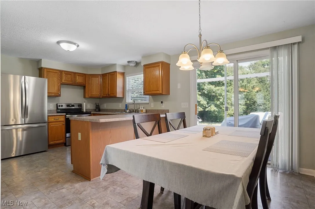 Dining space featuring a chandelier