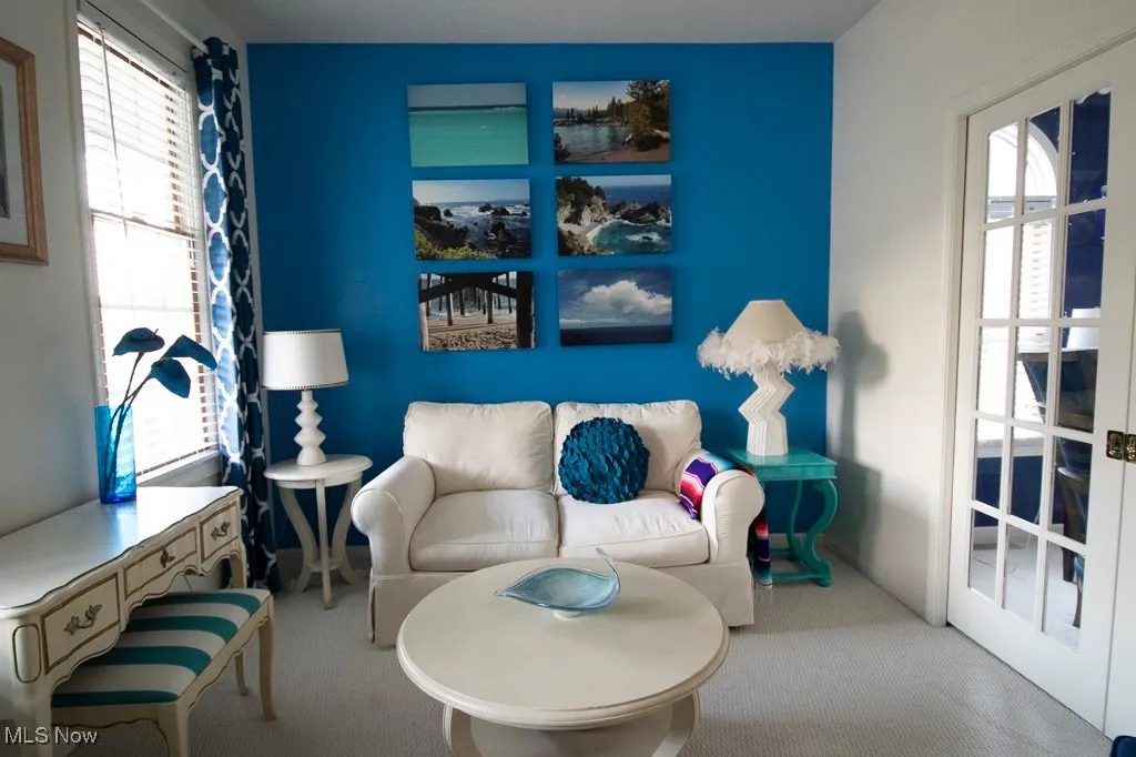 Living area with carpet flooring
