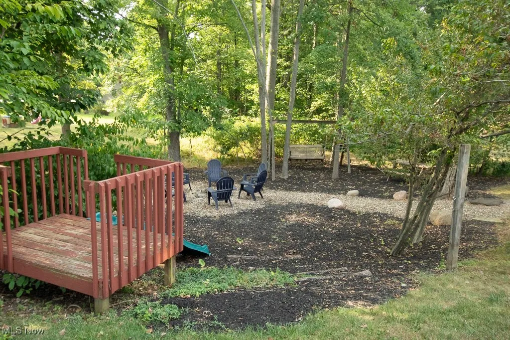 View of yard featuring an outdoor fire pit