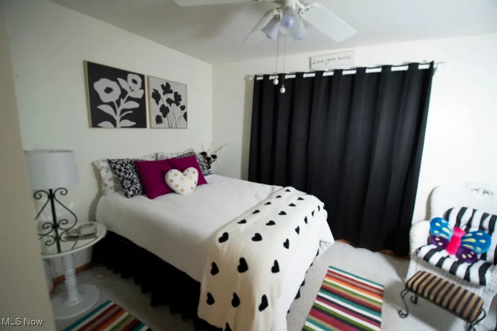 Bedroom featuring a ceiling fan