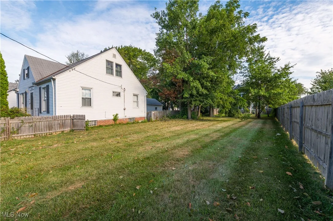 View of fenced backyard