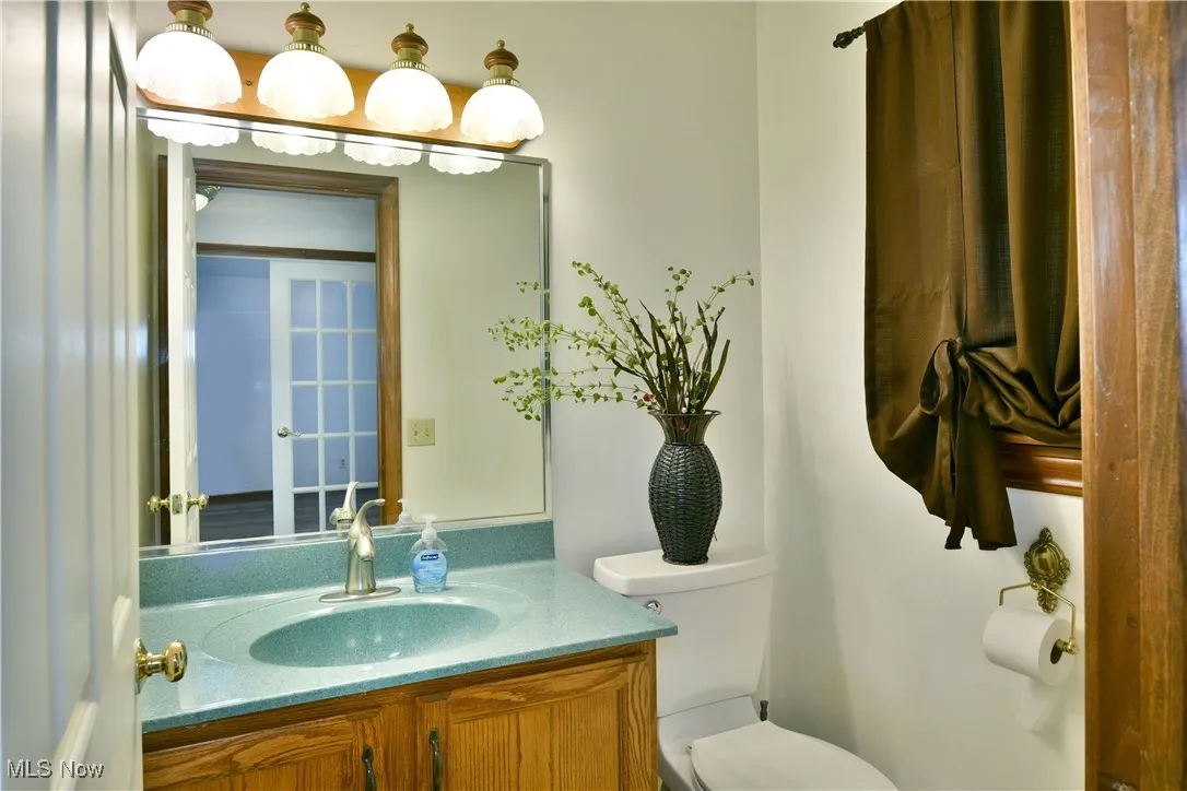 Bathroom with vanity and toilet